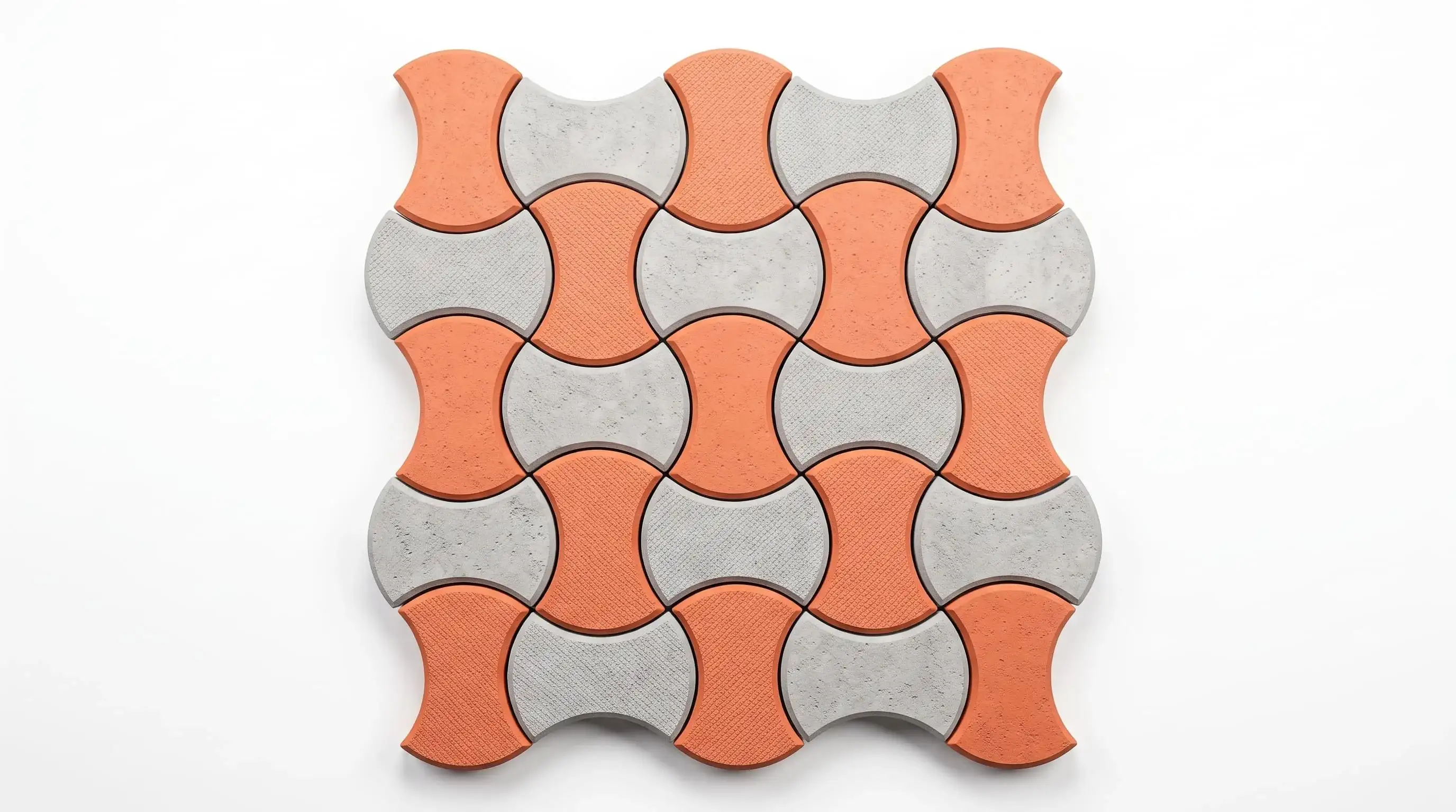 Round dumbbell paver installed in an interlocking pattern